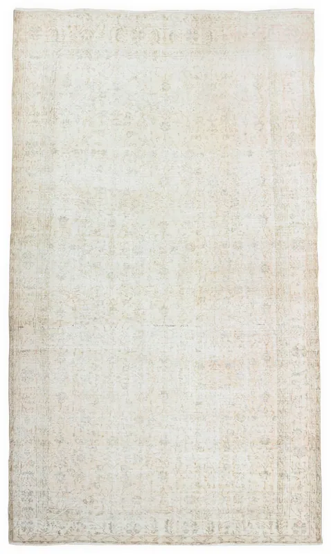 Full top view of the 6'10" x 10'2" beige floral vintage Anatolian rug on a white background.
