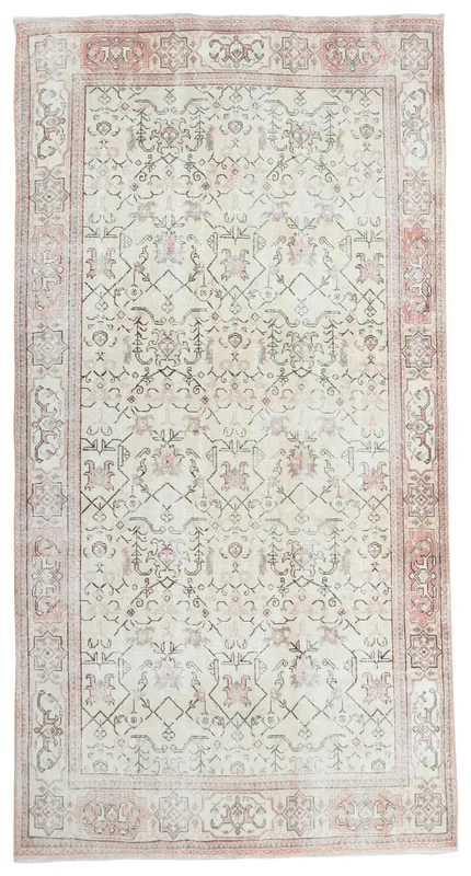 Full overhead view of the 6x10 ivory and rose vintage Anatolian rug