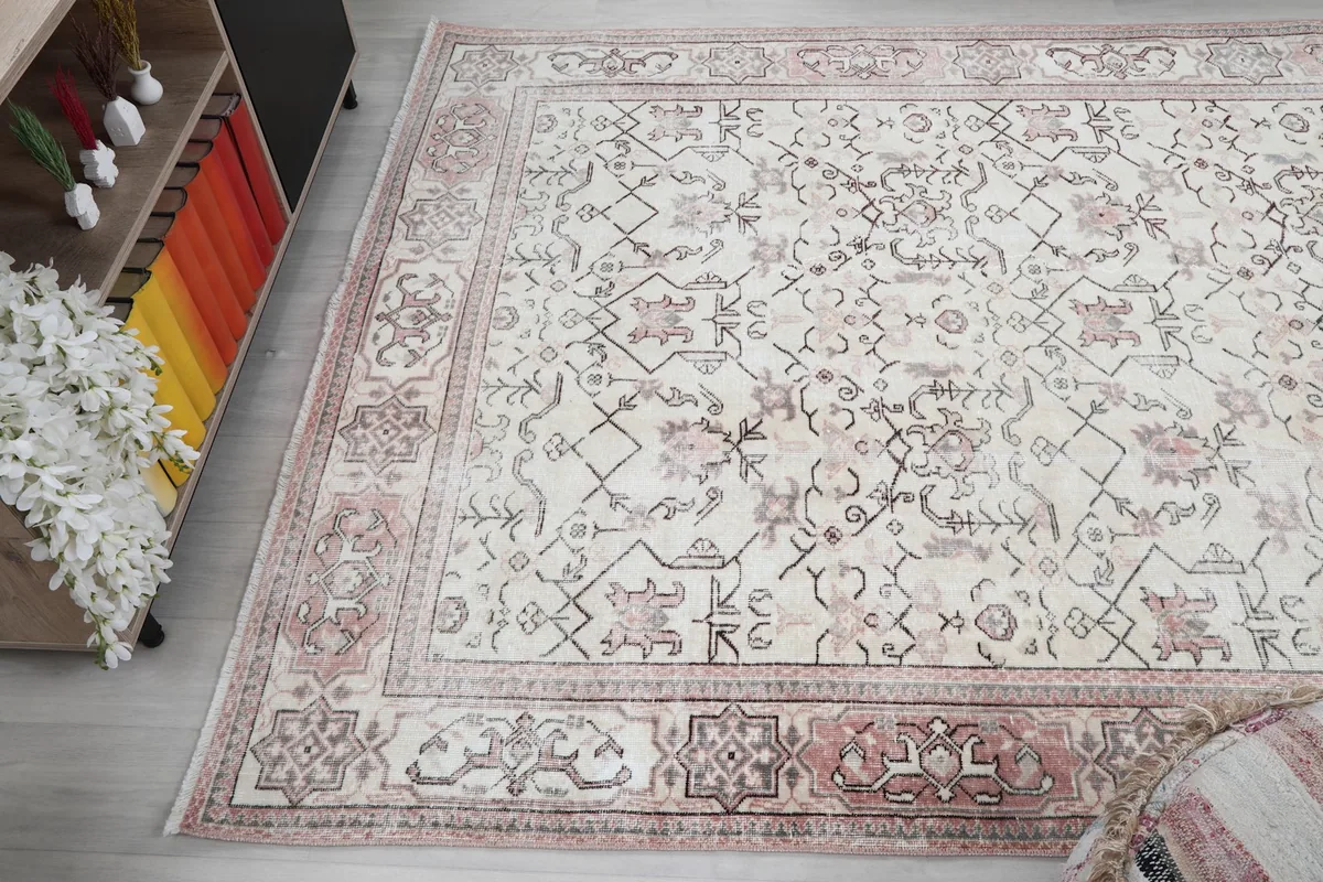 Overhead view showing the rug's full design and color palette in a room