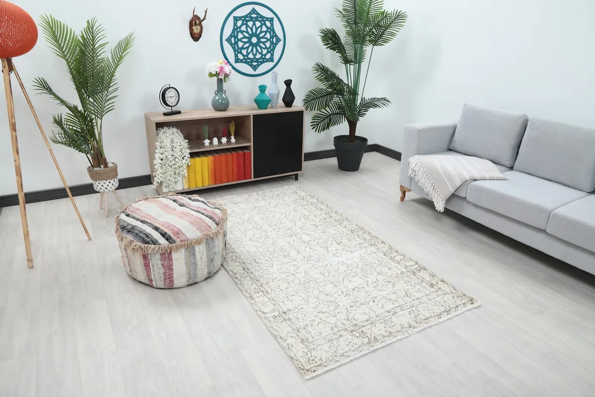 Angle view of the vintage rug in a living space with furniture