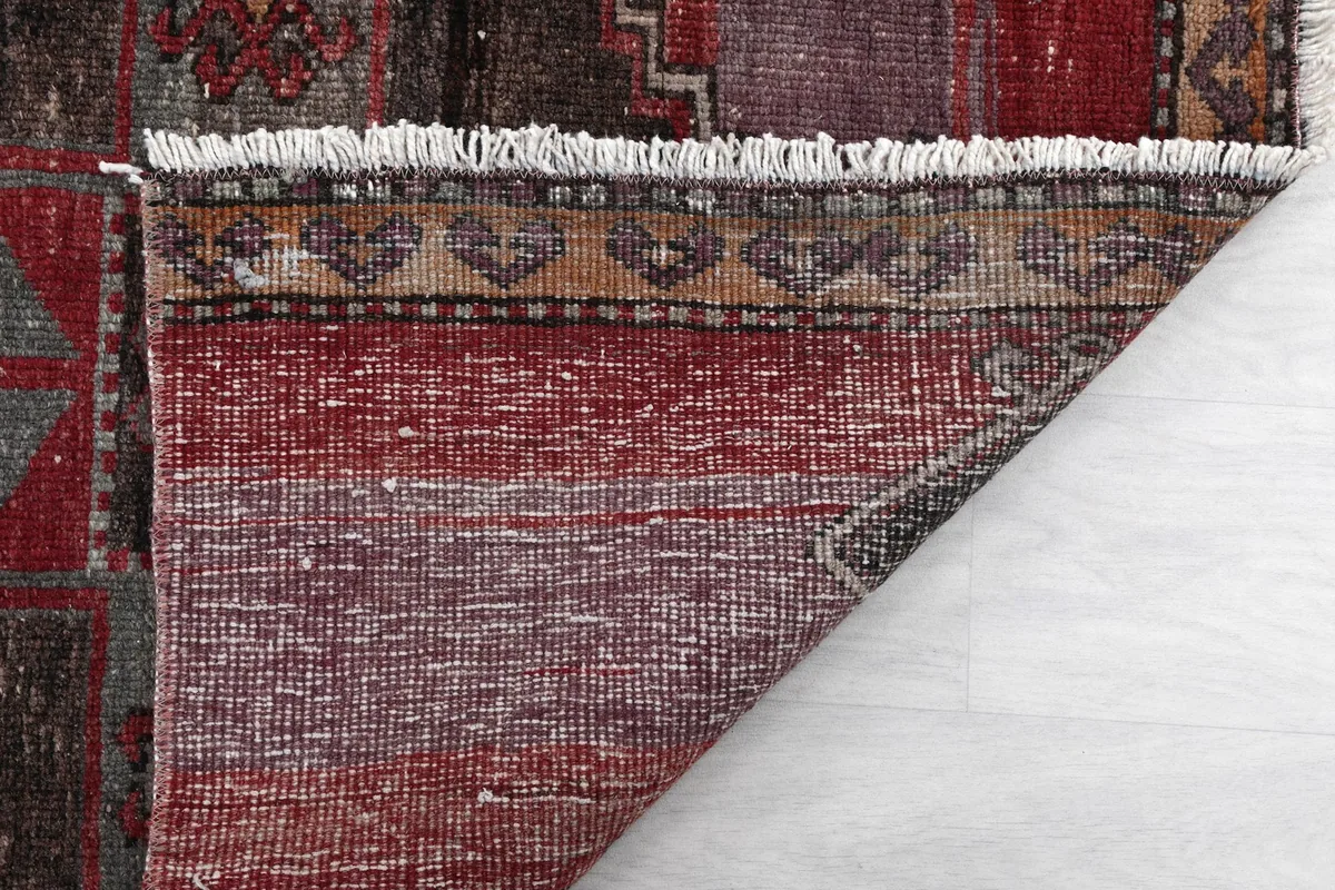 Close-up of the rug's pile and fringe, highlighting the texture and professional cleaning.
