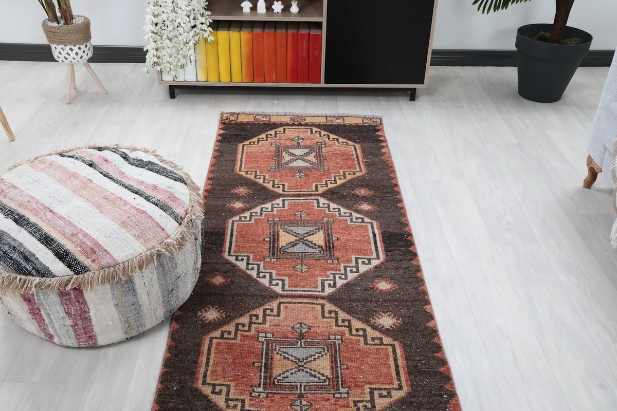 Overhead view of the runner rug in a room, showing its full design and placement