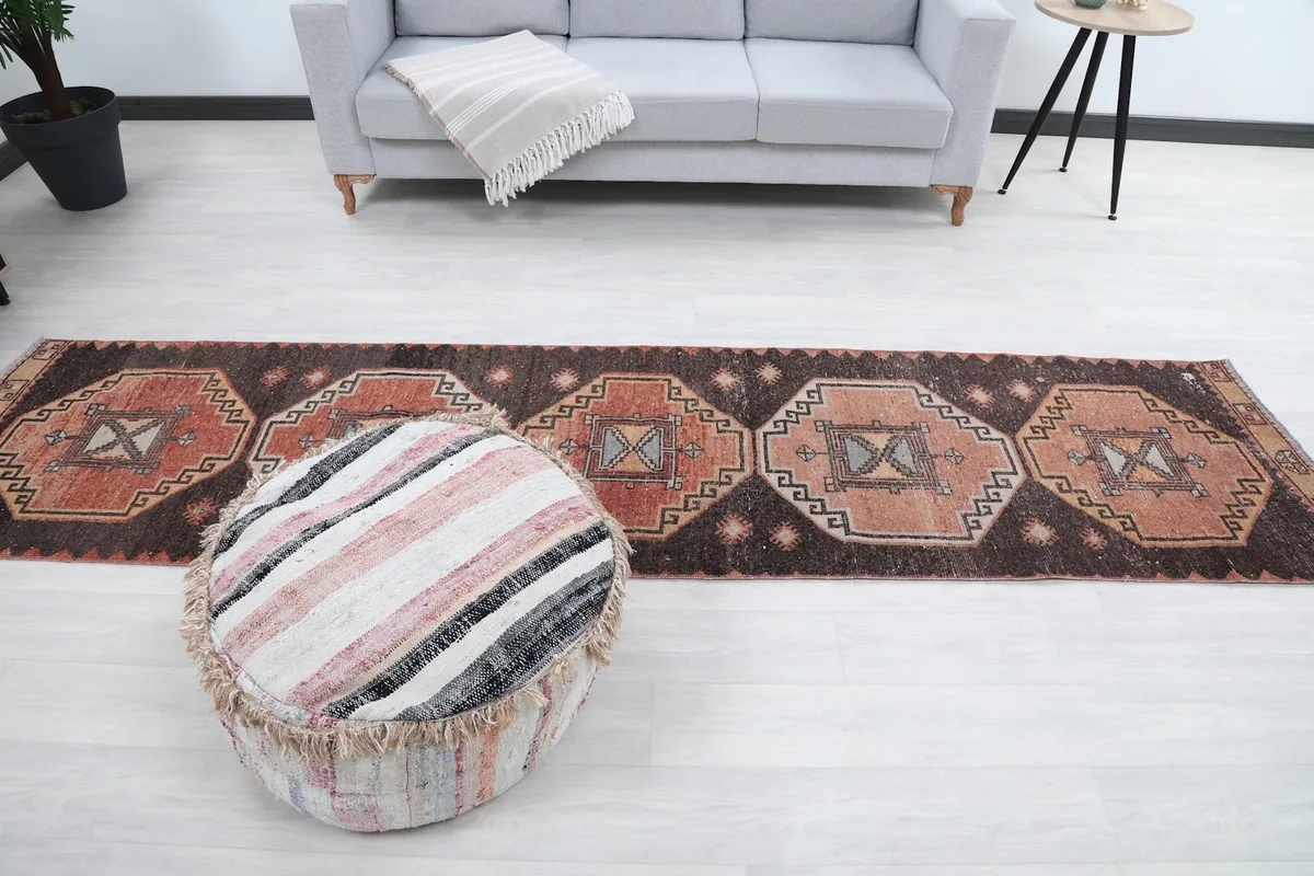 Full overhead view of the runner rug in the room setting, emphasizing its length