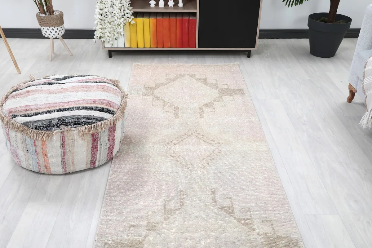 Overhead view of a section of the runner rug, showing its placement relative to furniture