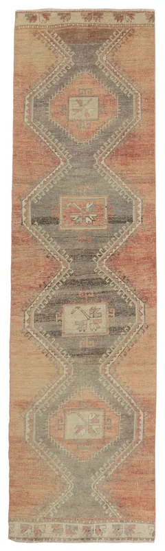 Full top view of the 3'0" x 11'2" vintage Anatolian runner with rust and gray geometric patterns