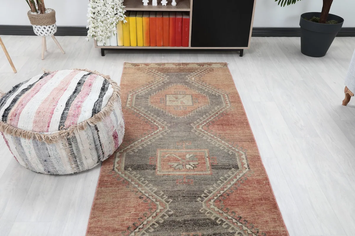 Overhead view of the runner rug in a room setting, emphasizing its length and pattern flow