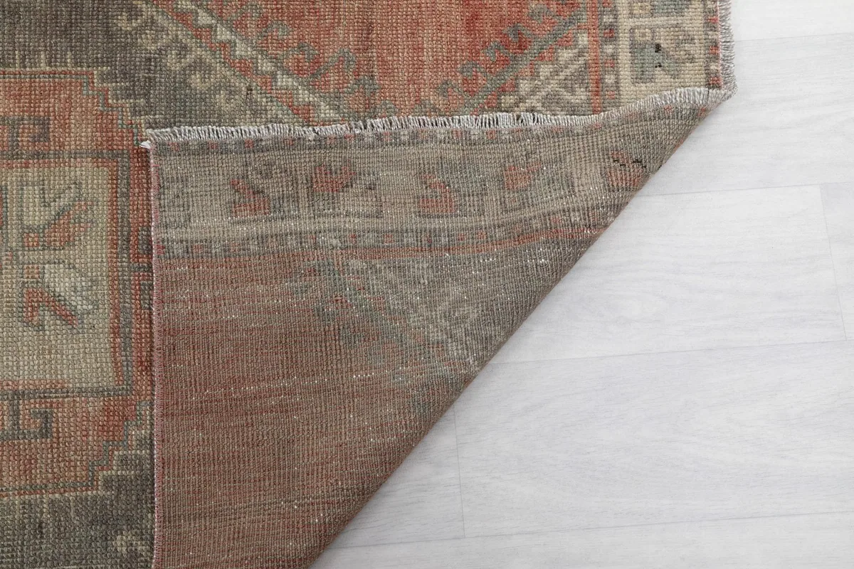 Another view of the rug's back, showing the consistent hand-knotted construction and foundation