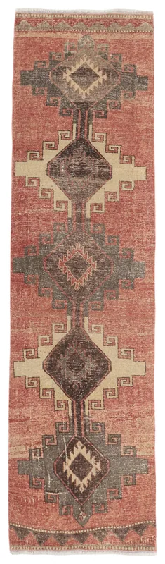 Full overhead view of the 3x11 rust, gray, and beige geometric tribal runner rug on a white background.