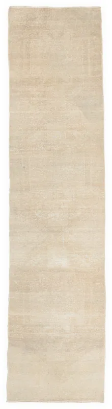 Full top view of the 2'9" x 12'10" beige faded geometric runner rug on a white background.