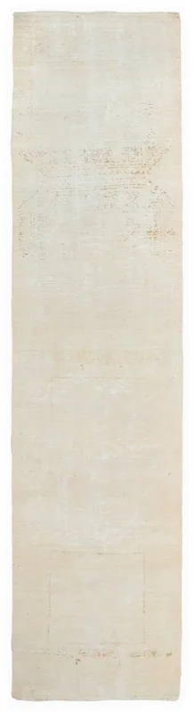 Full overhead view of the vintage Anatolian runner rug with ivory and beige tones