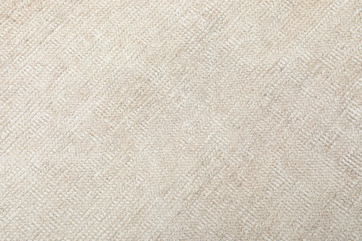 Close-up of the low wool pile, revealing the natural fiber texture and weave