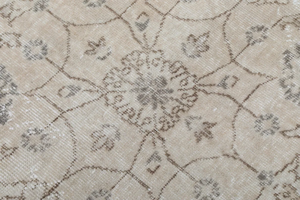 Detailed view of the low wool pile texture and subtle color variations