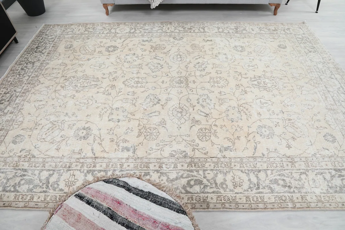 Full overhead view of the rug in a room, emphasizing its large size