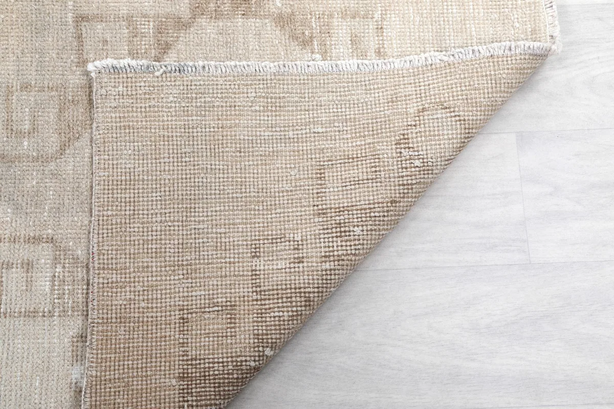 Another folded corner shot showing the reverse side of the hand-knotted runner construction