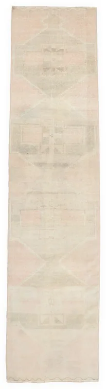 Full top view of the 2'11" x 12'10" beige and rose vintage Anatolian runner rug