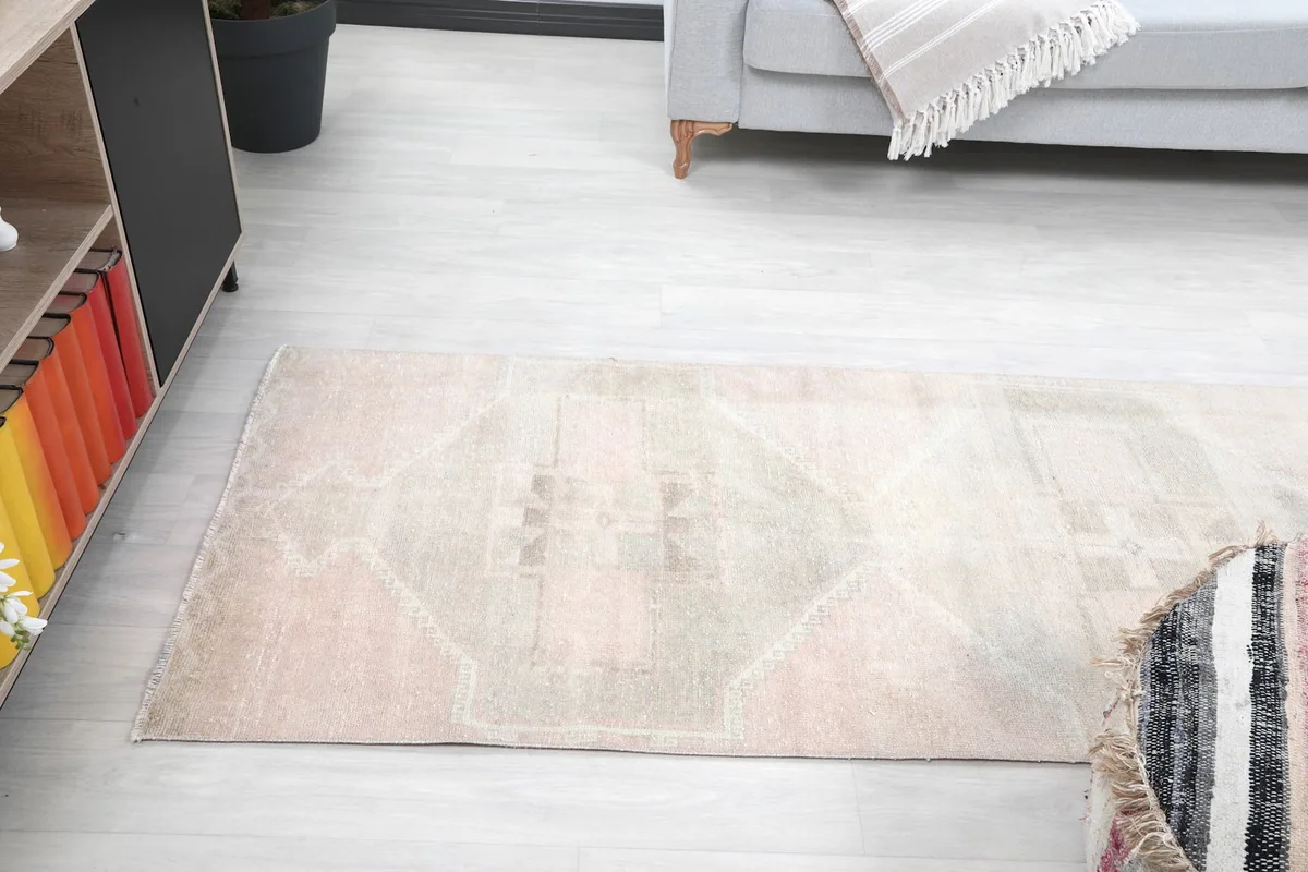 Angled view of the runner rug in the room, showing its placement relative to furniture