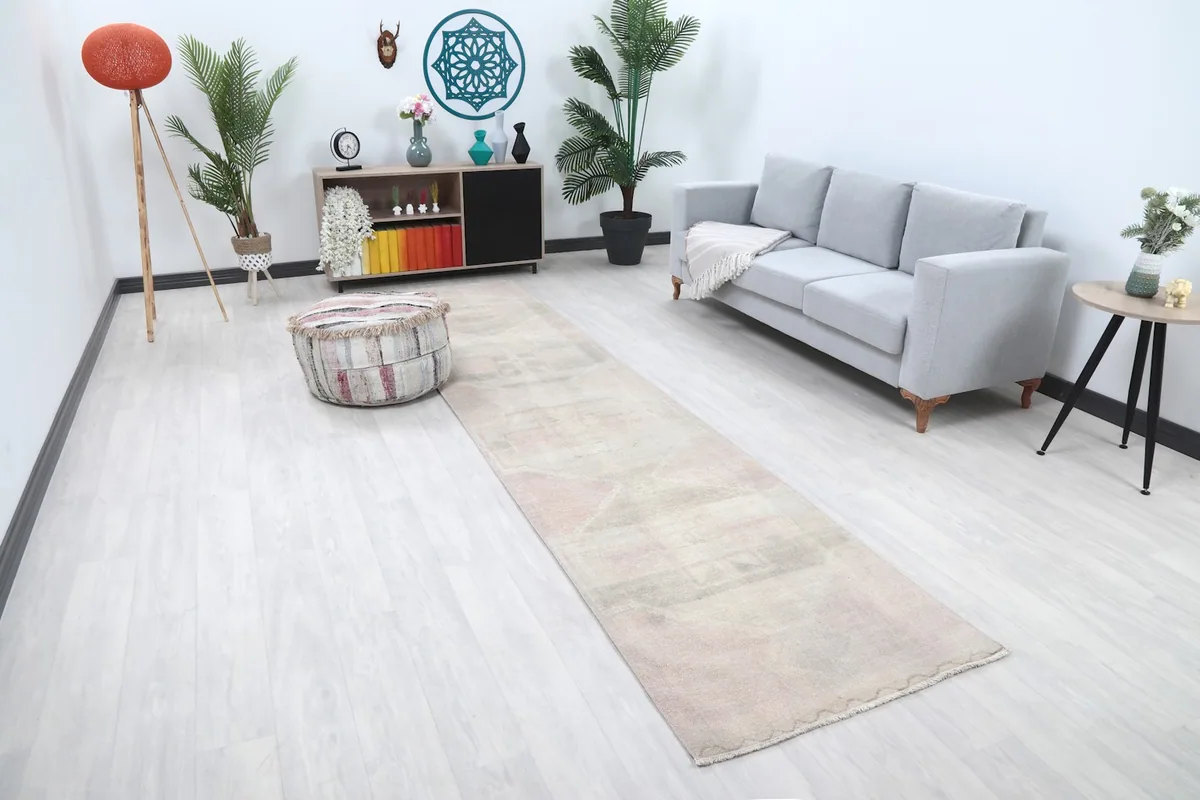 Angled view of the runner rug in a living space, highlighting its length and placement