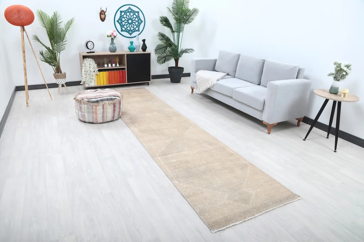 Elevated view of the Anatolian runner rug laid out in a contemporary living space with neutral decor