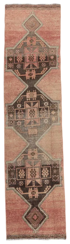 Full overhead view of the vintage rose and charcoal geometric runner