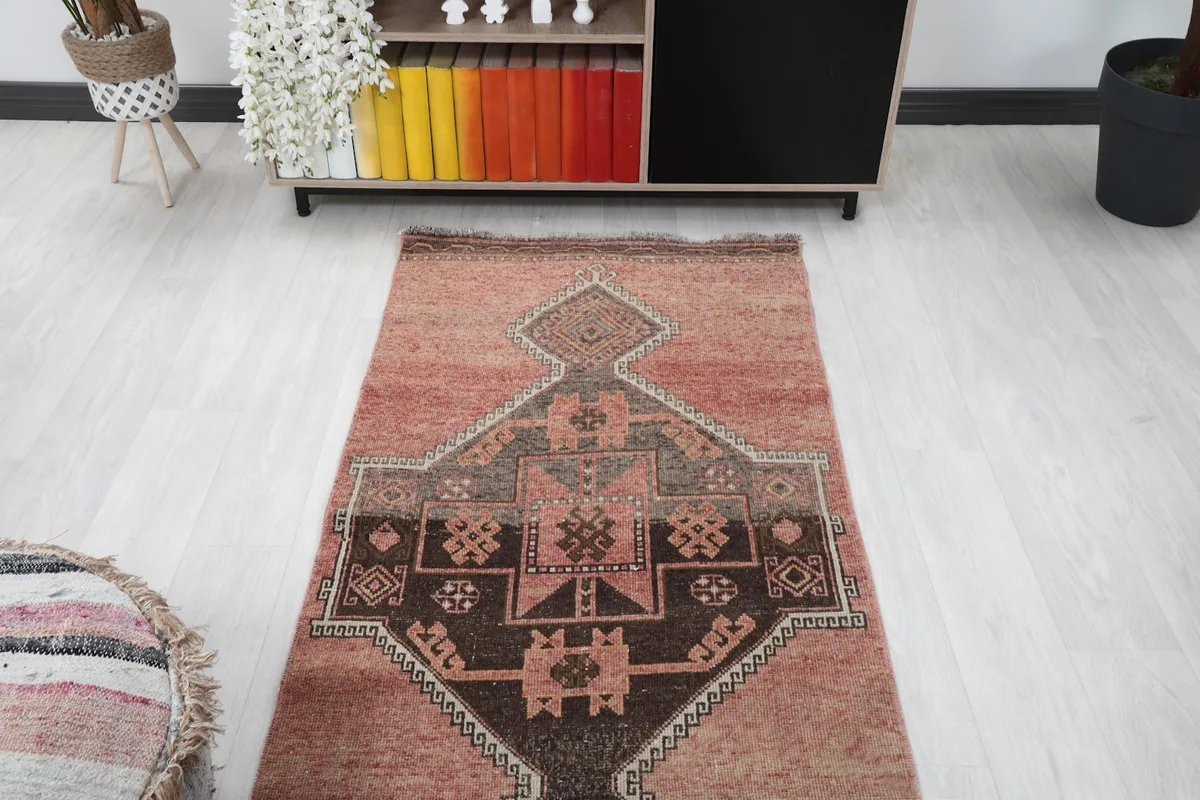 Overhead view of the runner rug in a room, showing its position relative to furniture
