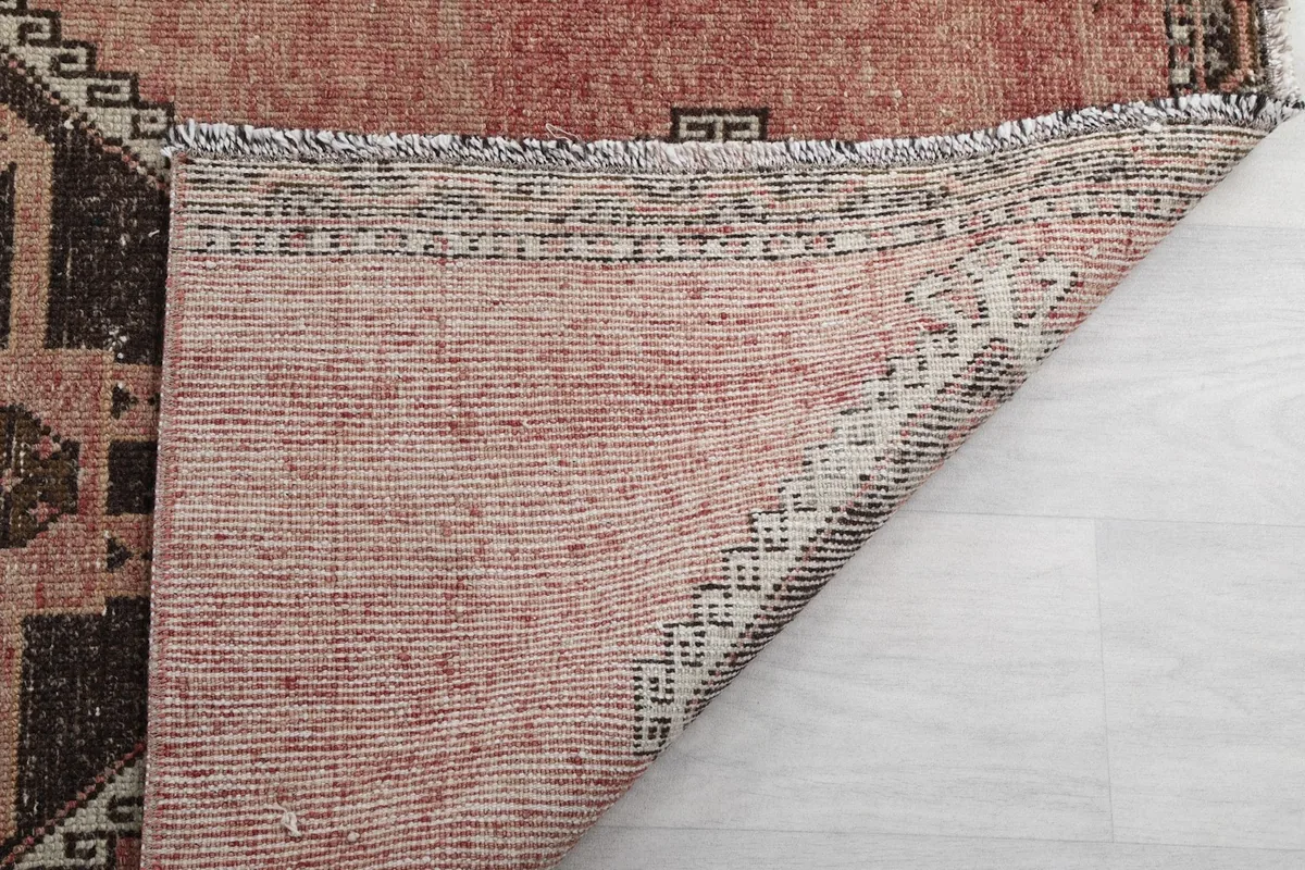 Back of the rug showing the tight weave and construction details