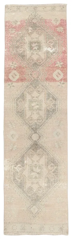 Full top view of the beige and rose geometric vintage runner rug