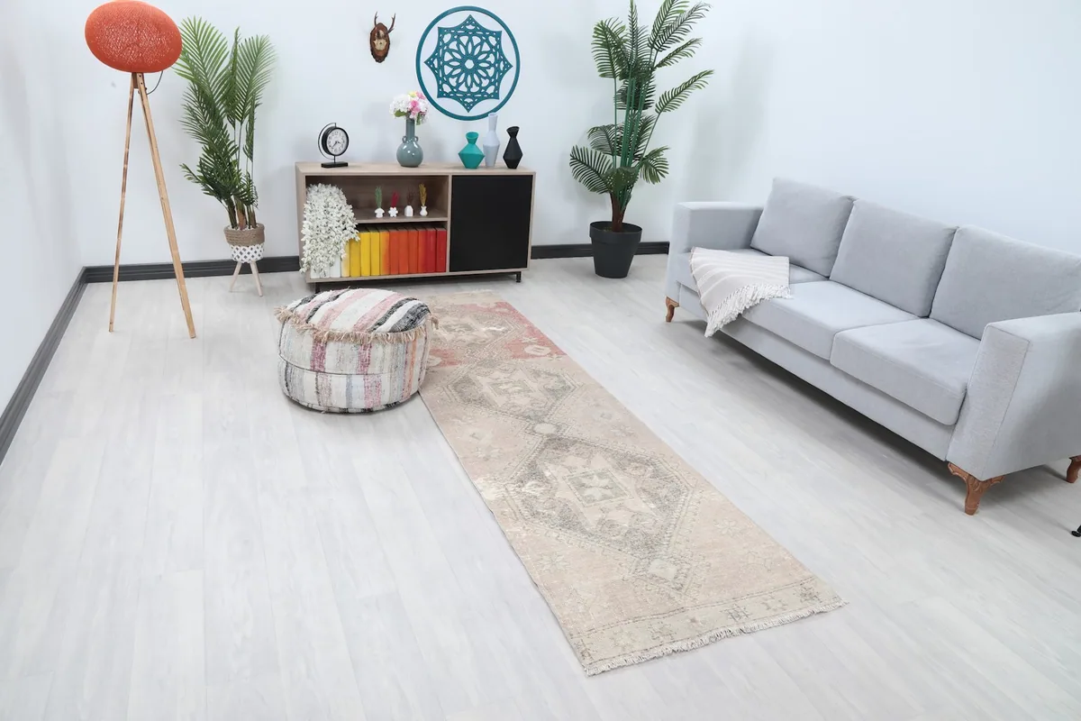 Overhead angle of the runner rug in a room, showing its length and colors