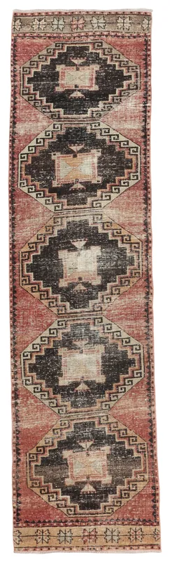 Full overhead view of a 2'8" x 10'11" rust and black geometric vintage Anatolian runner rug