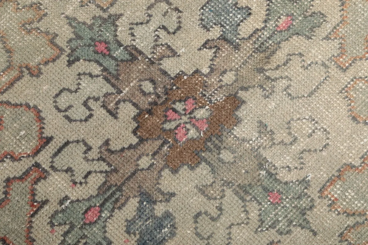 Close-up of the low wool pile, showing texture and subtle color variations