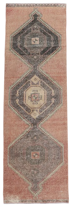 Full top view of the vintage rose and charcoal medallion runner rug