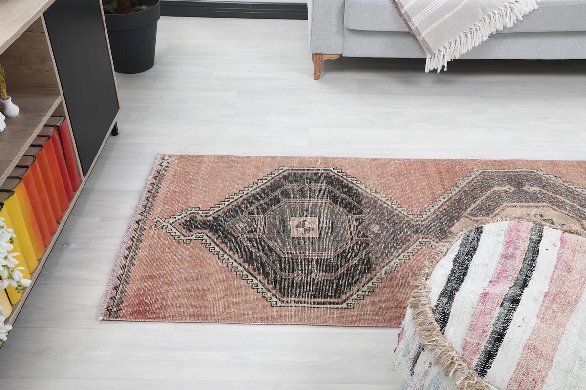 Angle view of the runner rug from the side, highlighting its placement in a room