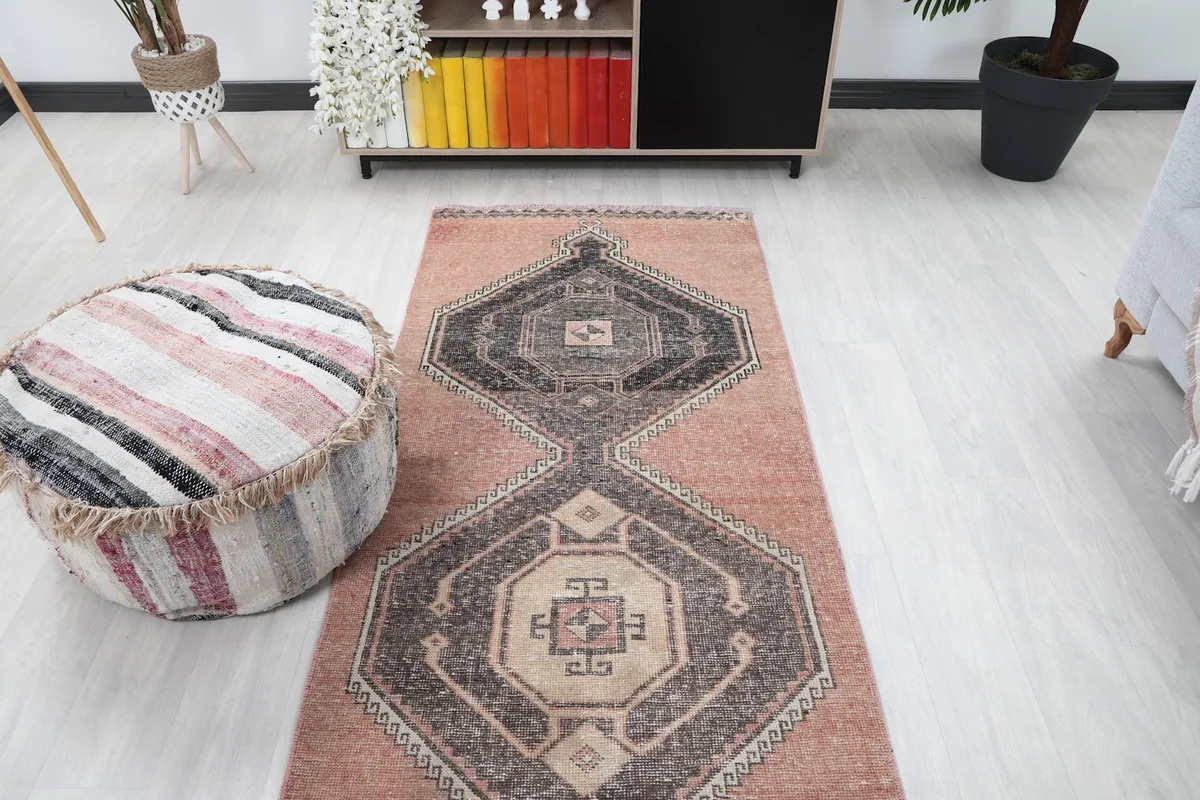 Overhead view of the runner rug in a room, showing its length and design