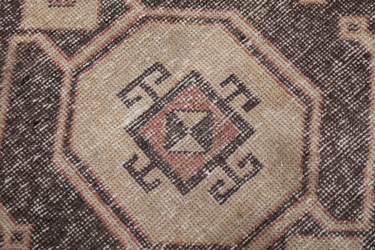 Detailed view of the intricate geometric pattern within the central medallion