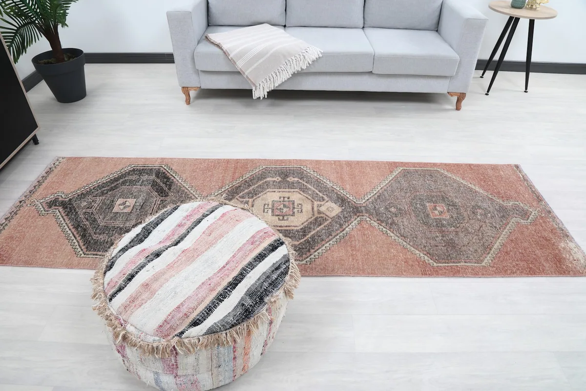 Overhead view of the runner rug's full length with surrounding decor