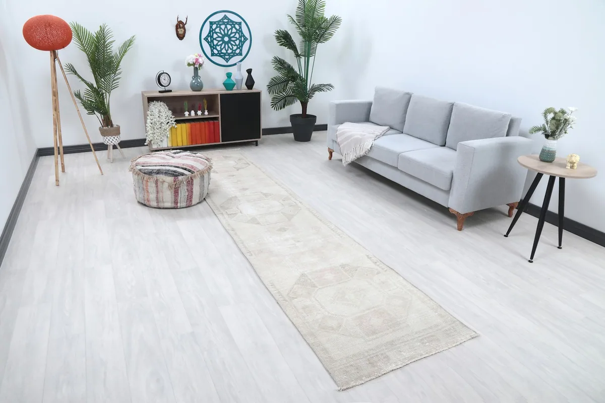 Runner rug in a modern living room setting, showing its length and placement
