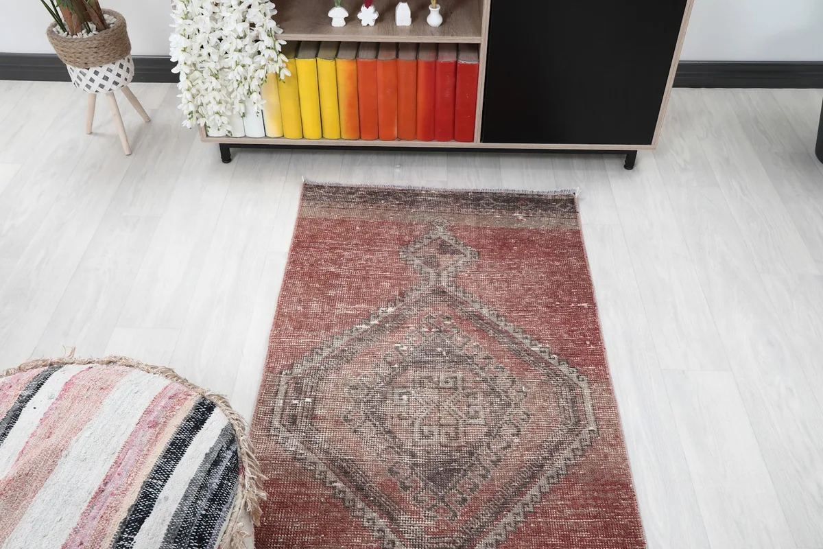 Overhead view showing the top section of the runner with a decorative ottoman