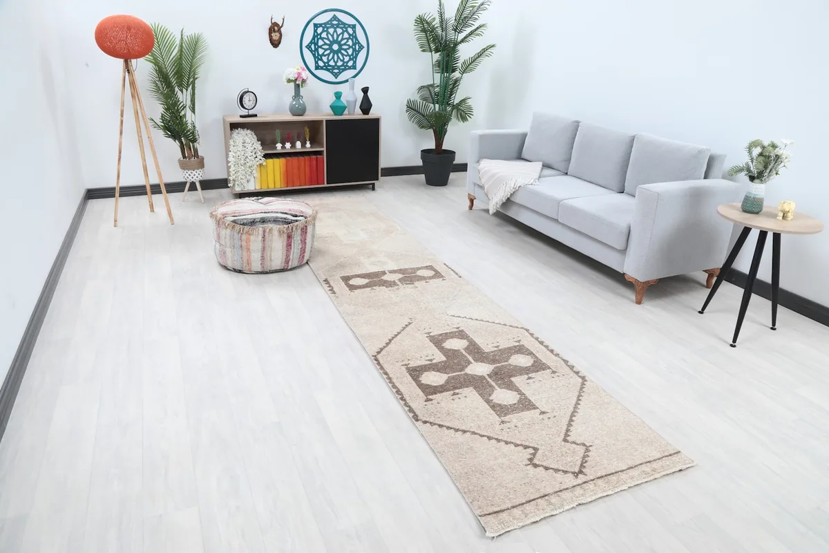 Angle view of the runner rug in a living room setting, highlighting its placement and scale.