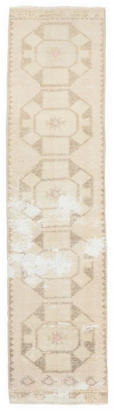Full top view of the beige and brown geometric vintage Anatolian runner rug