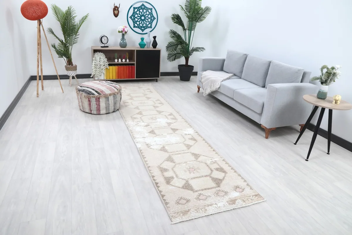 Angled view of the beige geometric runner rug in a modern living space
