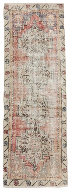Full overhead view of the 2'8" x 8'6" rust geometric Anatolian runner on a white background.