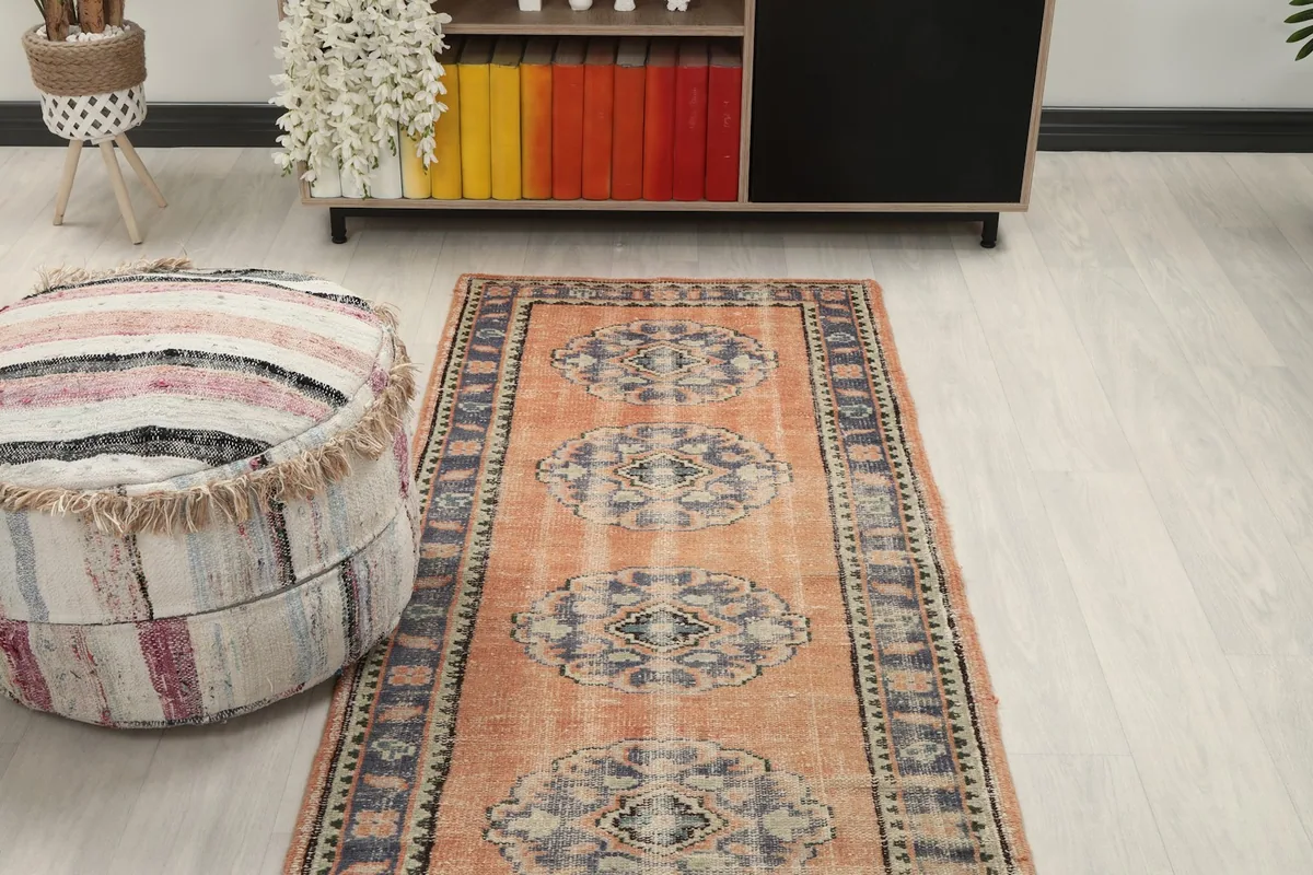 Overhead view of the runner rug in a room, focusing on the central design elements