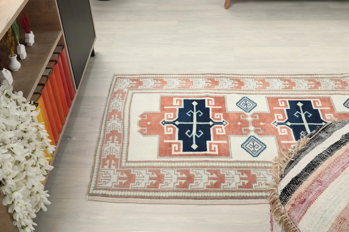 Wider angle view of the runner on the floor, showing its length and how it complements the room's aesthetic.