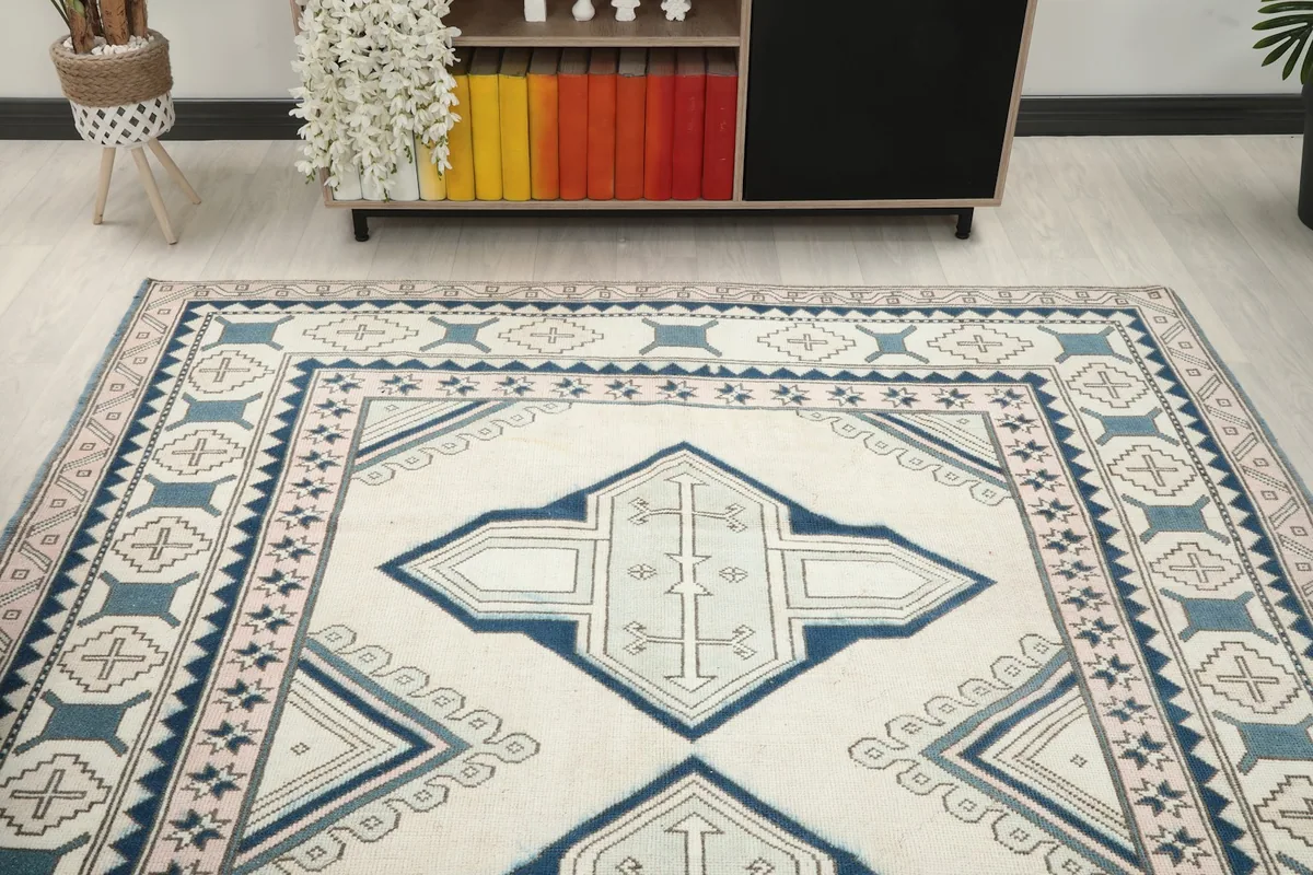 Overhead view of the rug in a room, highlighting the full pattern and scale