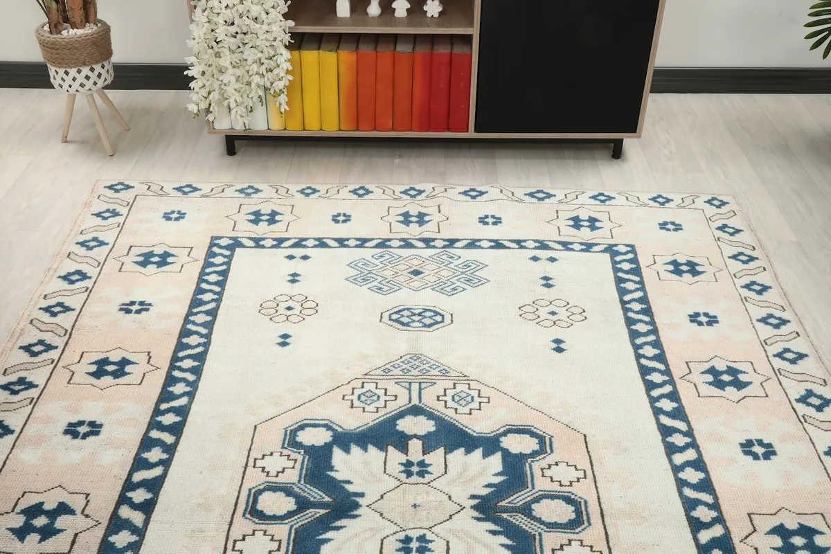 View from above showing the rug's patterns and colors in a room setting