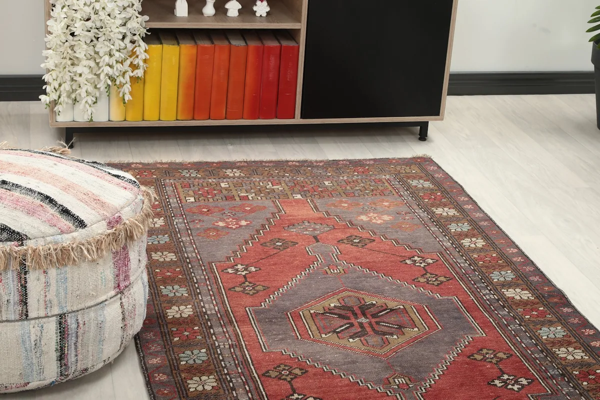 Close-up angle showing the rug's central medallion and border in a room setting