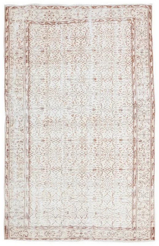 Full overhead view of the 5x8 ivory and rust vintage Anatolian area rug