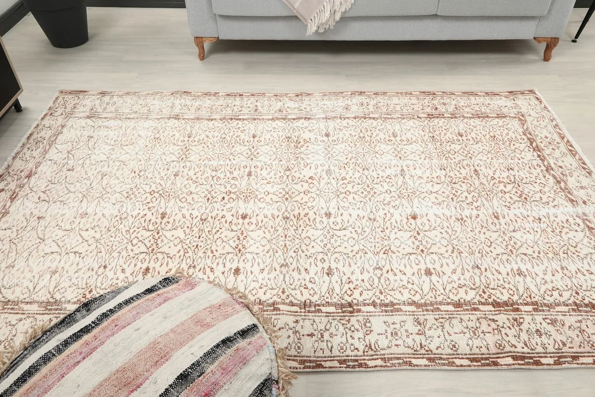 Frontal view of the rug in a room setting, showing its full length