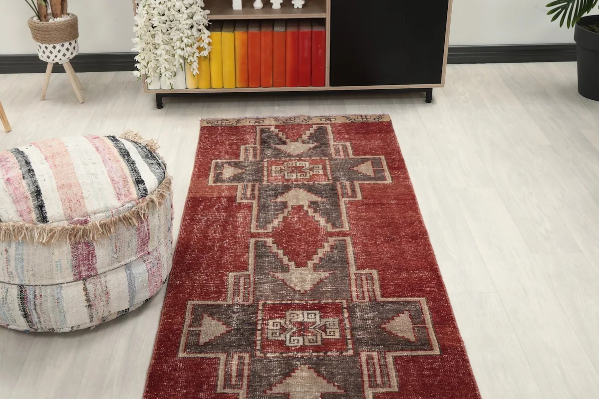 Runner rug viewed from a higher angle in a room, showing its texture and pattern flow