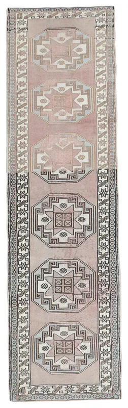 Full top view of the 2'10" x 11'4" rose geometric Anatolian runner