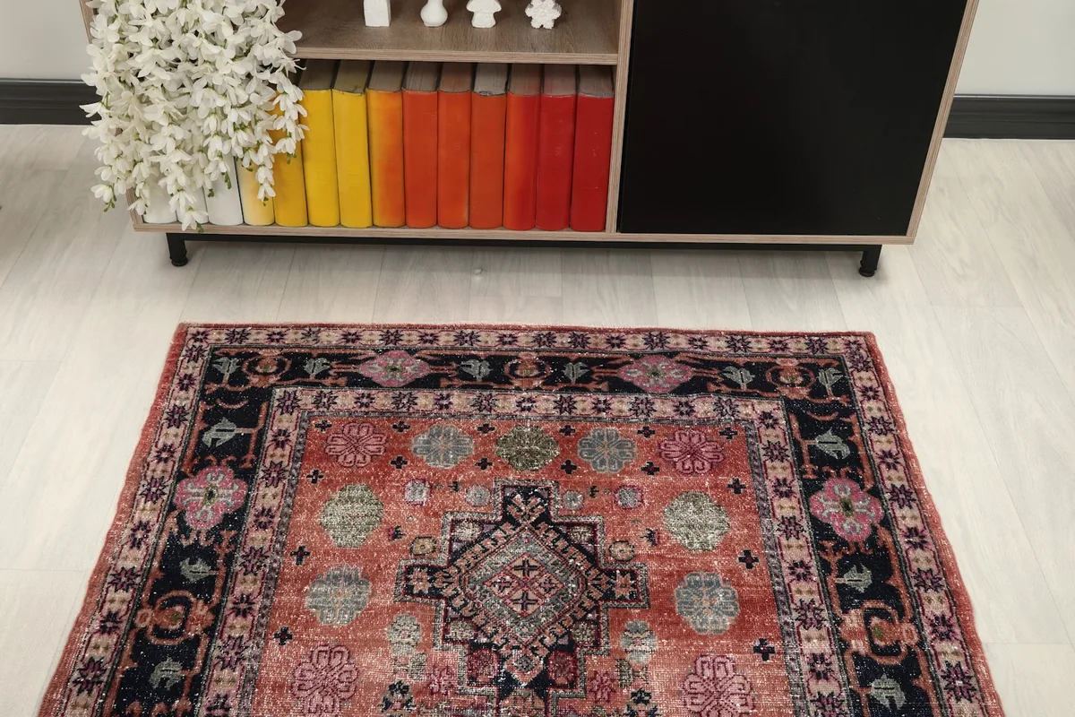 Overhead view of the rug, providing a good perspective of its overall design and colors in a room setting.